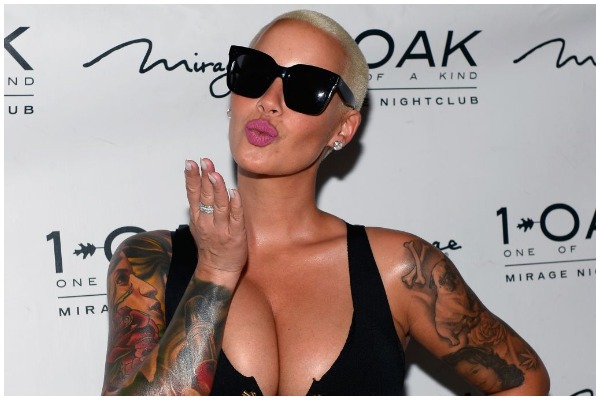Amber Rose Getting Breast Reduction Surgery – “My boobs are stupid heavy”!