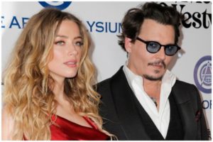 Amber Heard hits Johnny Depp